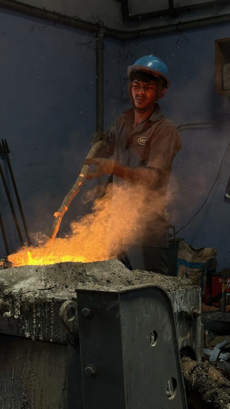 Molten grey iron pour